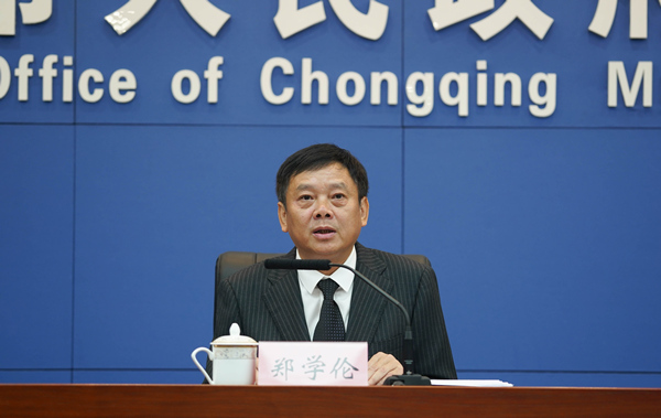 中共江北區委常委、區委宣傳部部長、區委新聞發言人鄭學倫發布相關內容。吳汪洋攝