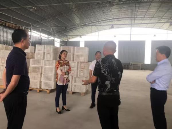 走訪民營企業。潼南區委統戰部供圖