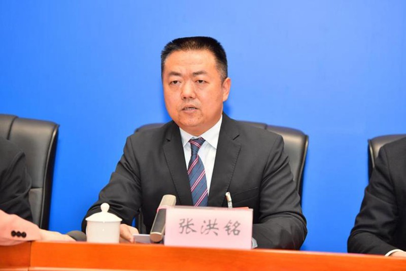 張洪銘介紹相關情況。王加喜攝