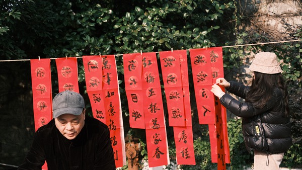 年豬節現場寫春聯。曹若琳攝